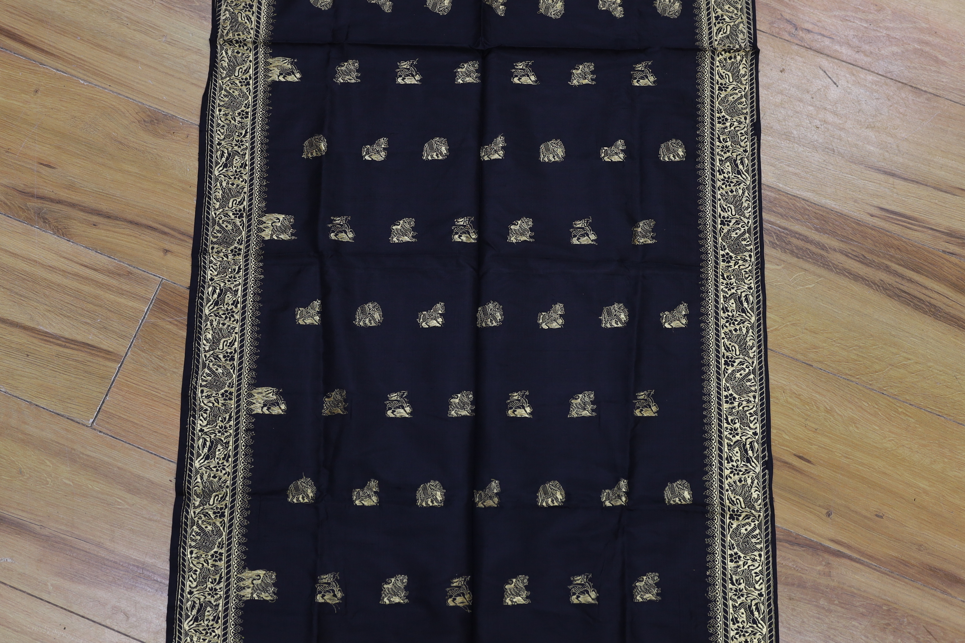 A gold thread Indian embroidered stole, 184 x 57cm